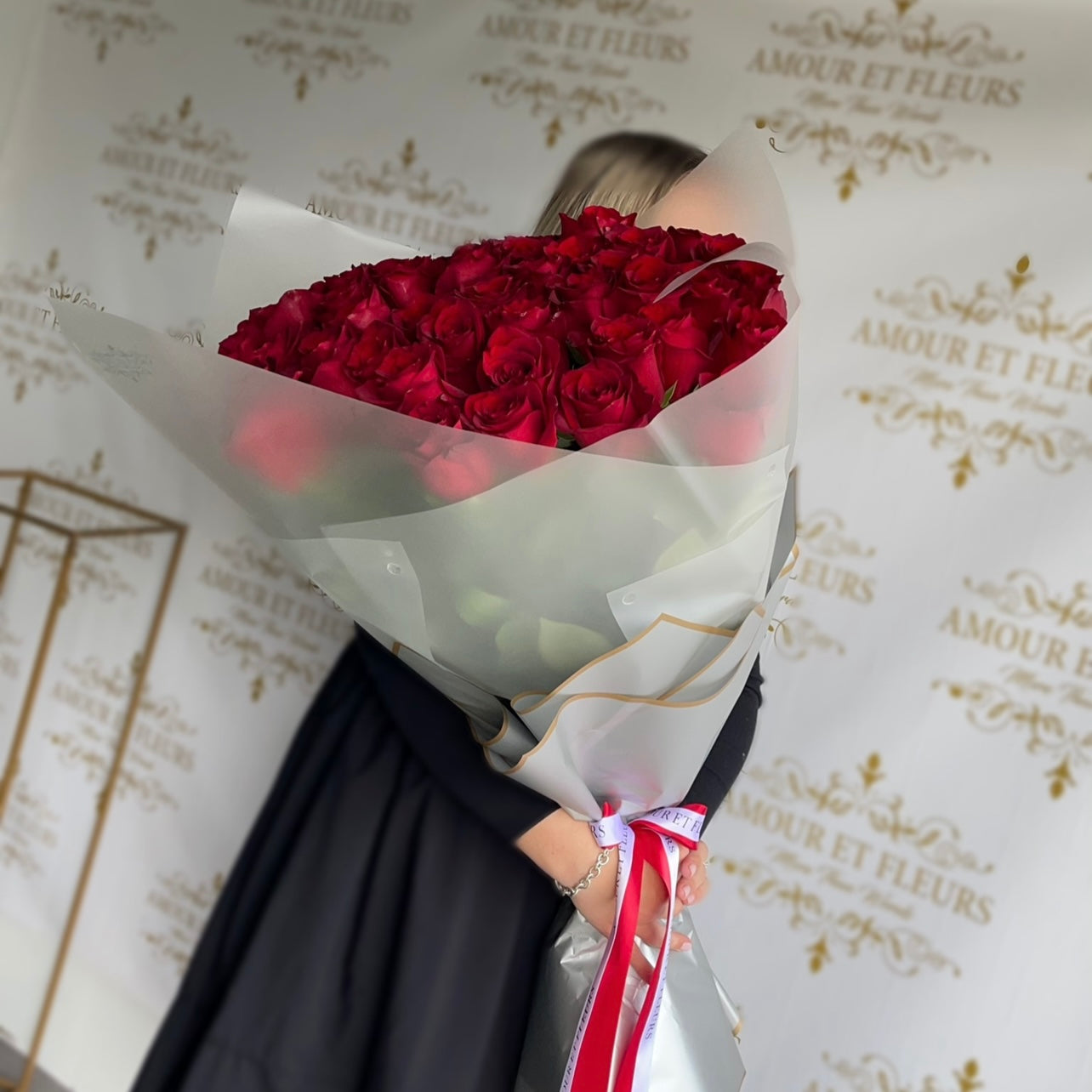 50 roses bouquet, red in white paper wrap