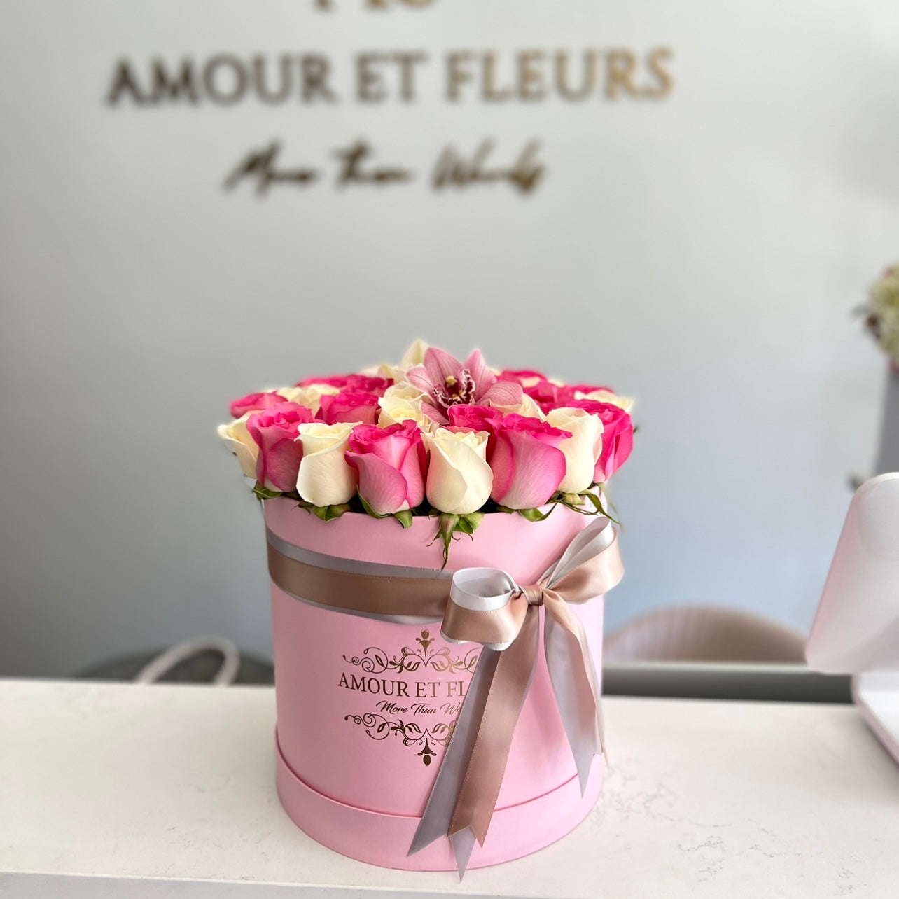 Eleganté Medium Floral Arrangement, box of roses pink and white