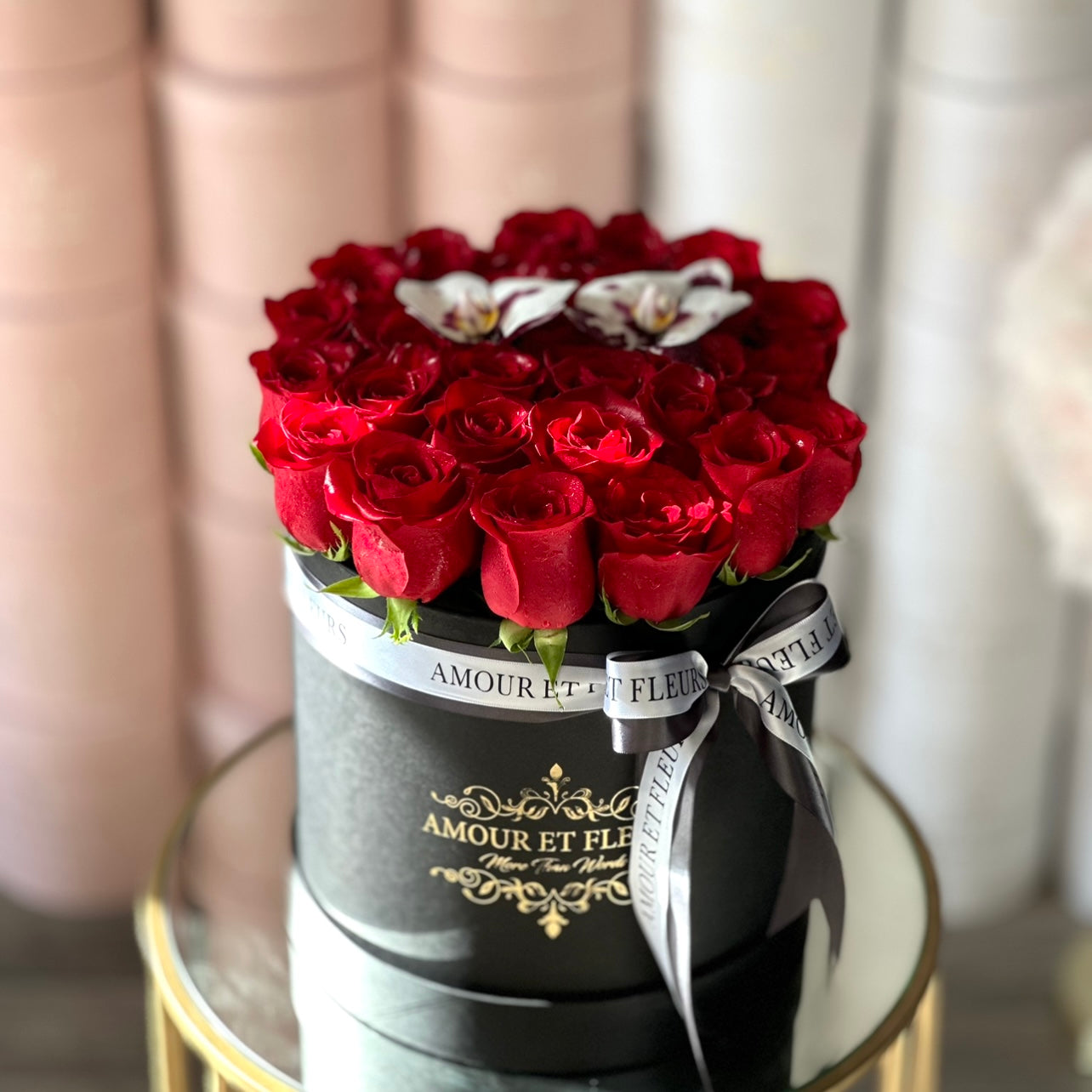 Eleganté Medium Floral Arrangement, black box of red roses