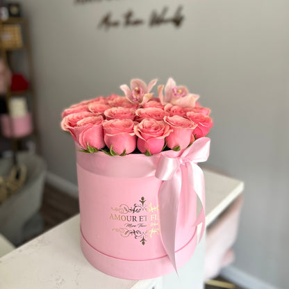 Eleganté Medium Floral Arrangement, pink roses in a pink box